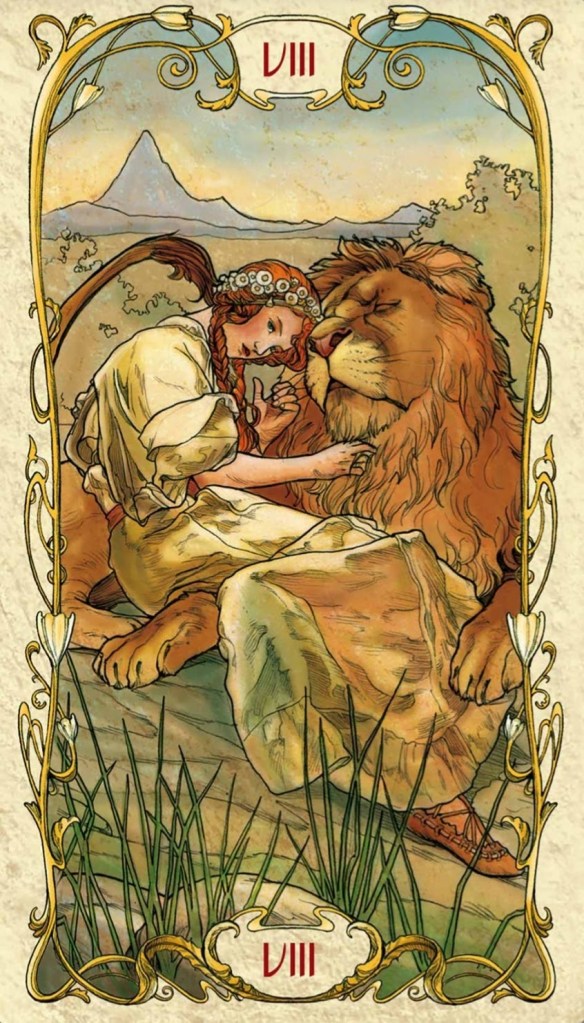 The Strength card from the Tarot Mucha by Lo Scarabeo—a young woman has a loving interaction with a lion.